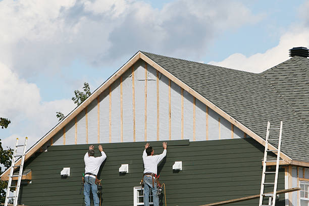 Professional Siding Contractor technician working in Pine Lake, GA